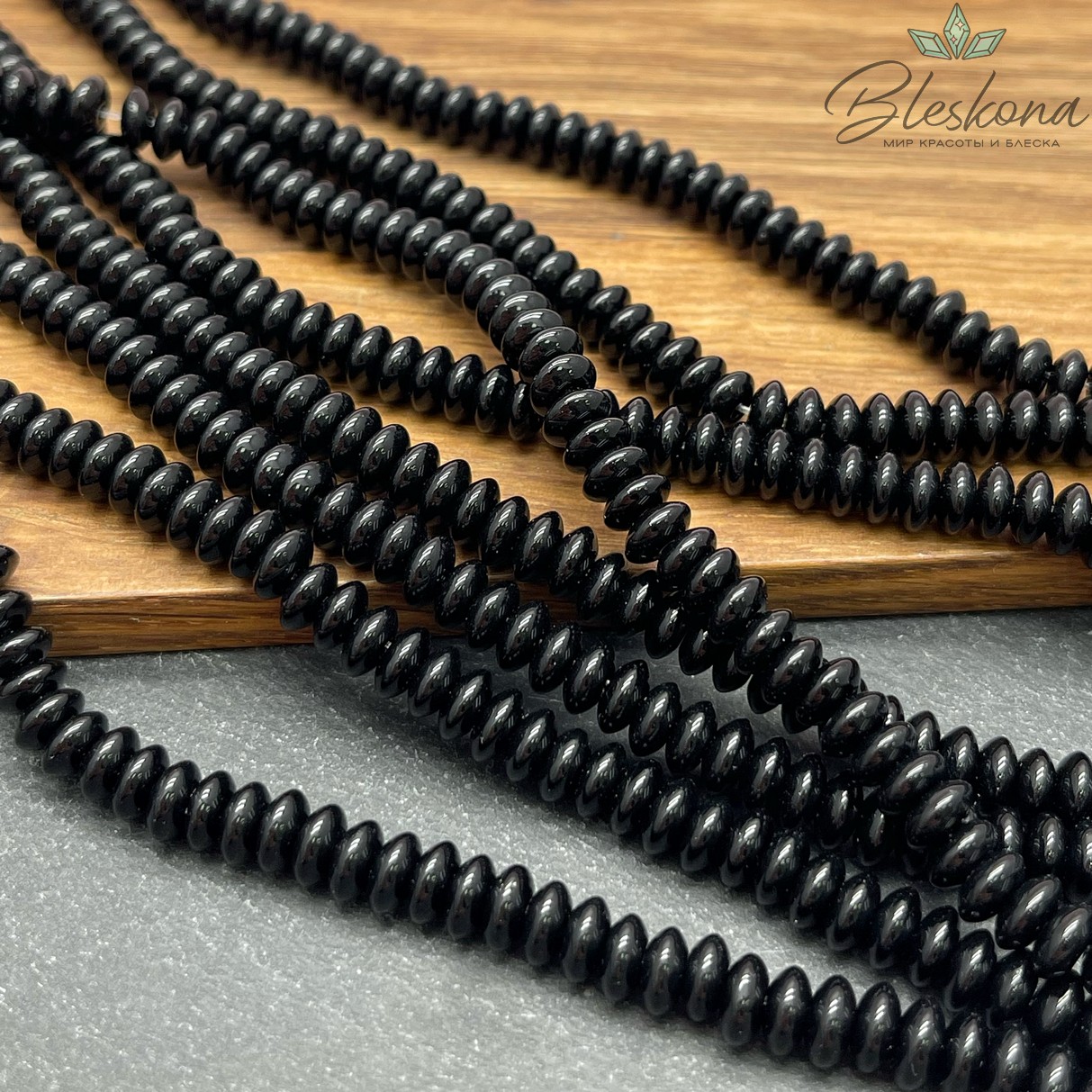 Агат черный рондель острый 6*3 мм 