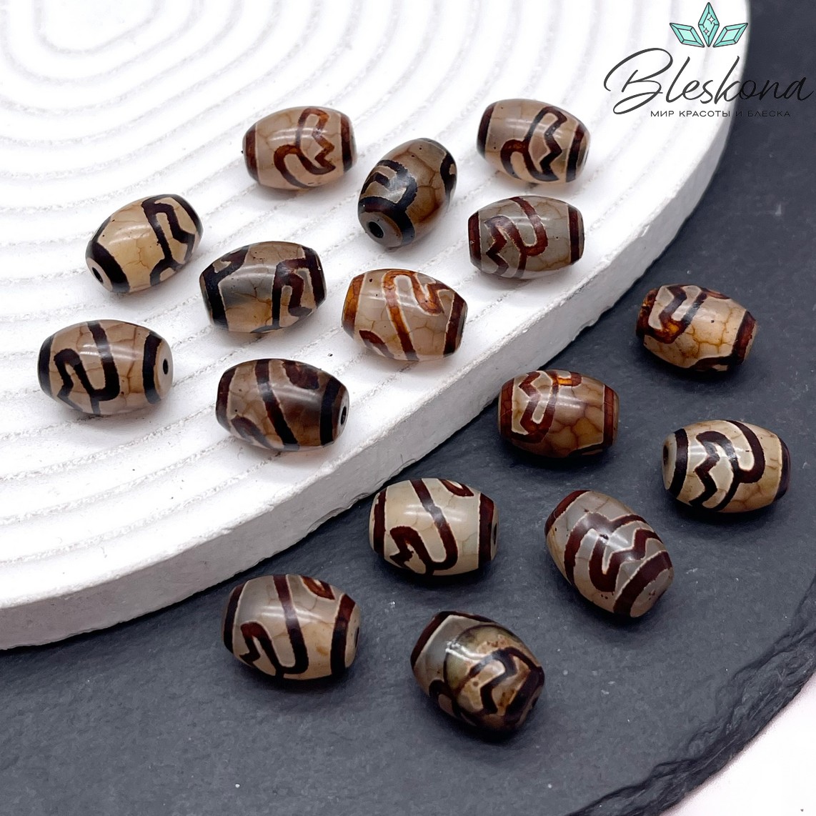 Бусина Дзи Лотос серо-коричневый бочонок 10*14 мм