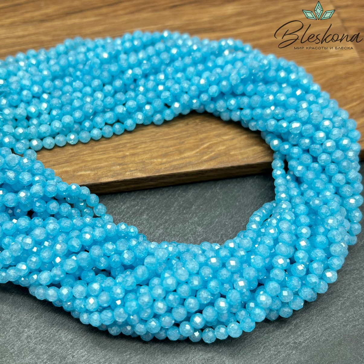 Циркон Glow ярко-голубой огранка 4 мм (кубический цирконий, фианит) 