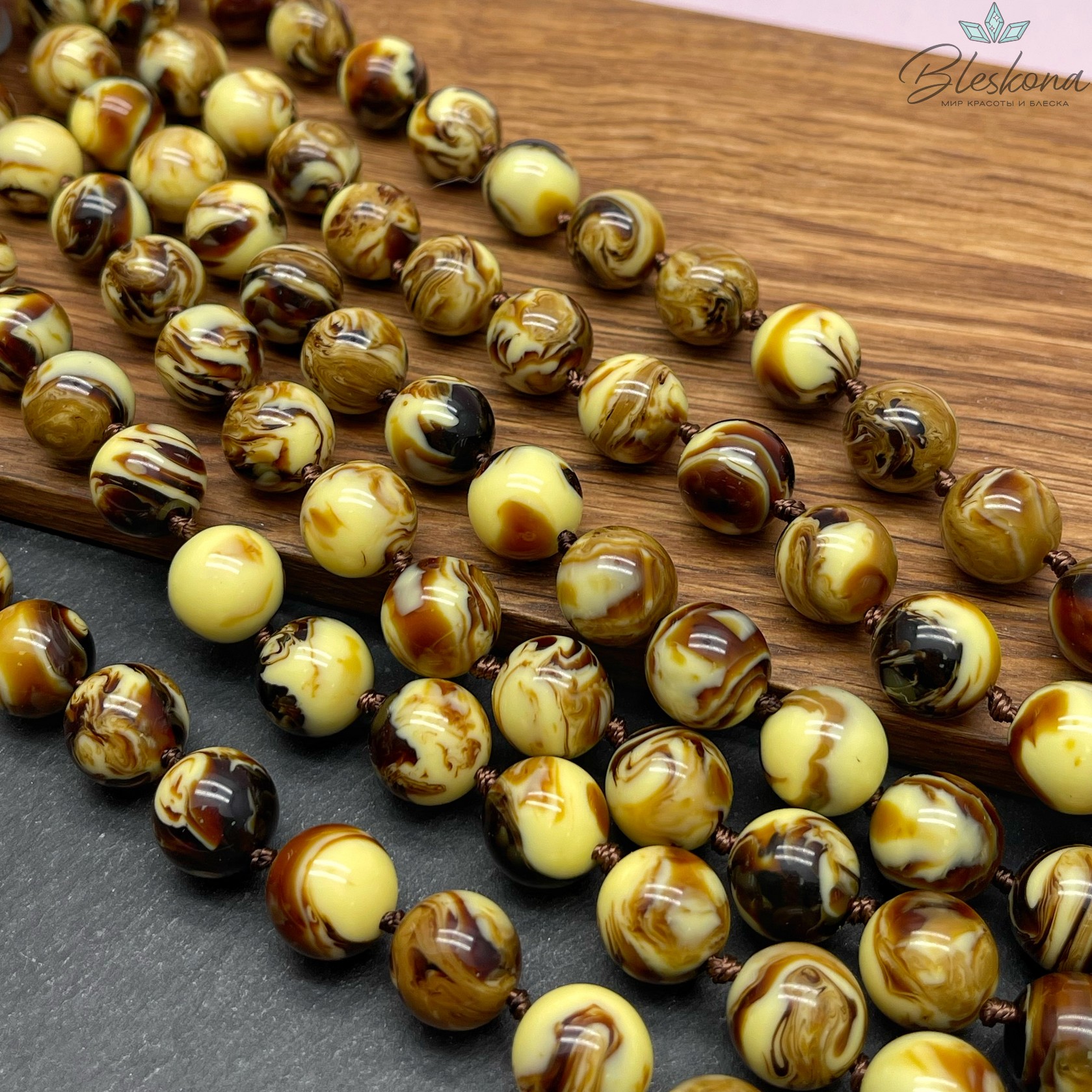 Янтарь шар шоколадный с включениями 12 мм