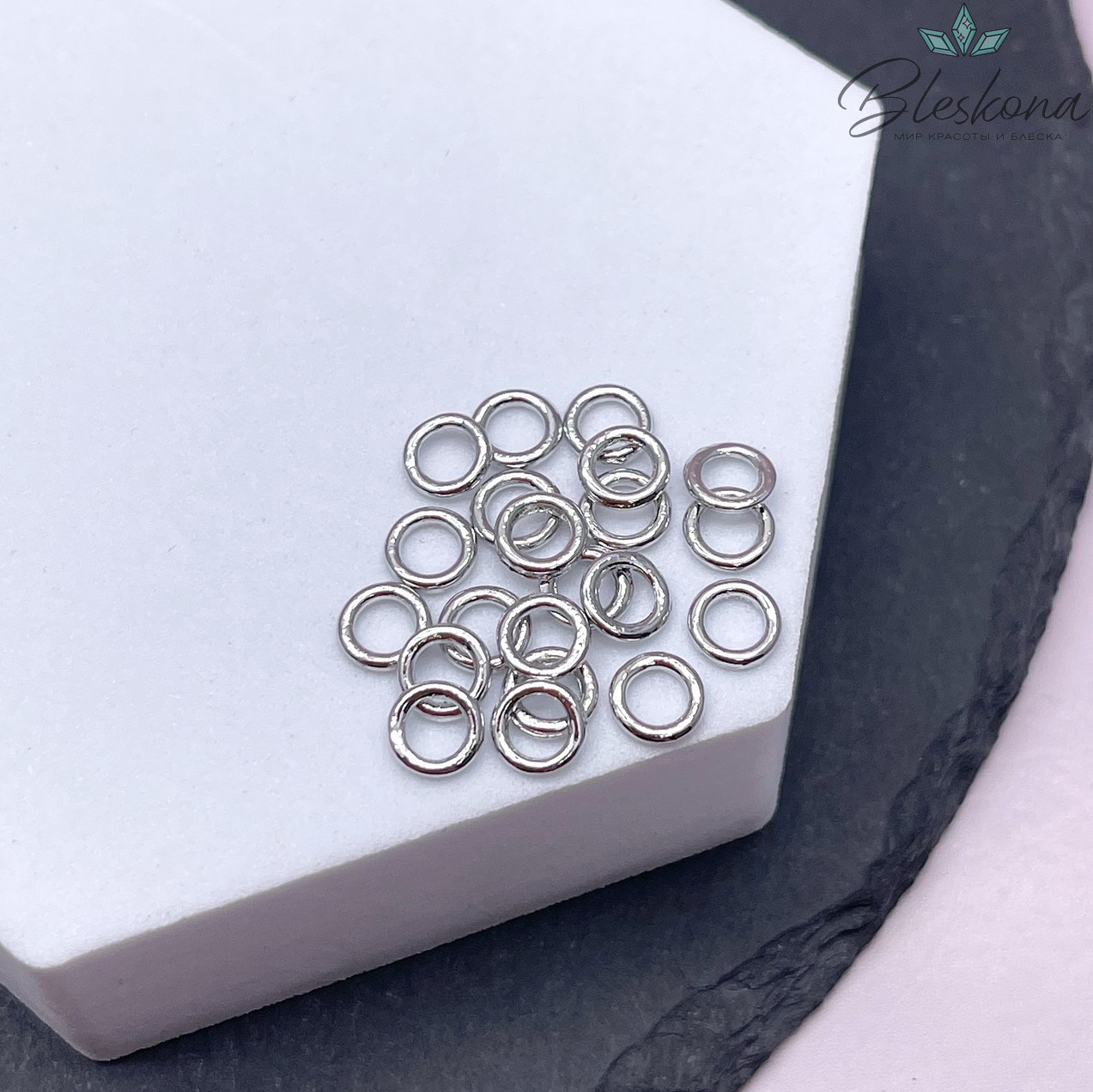 Колечки неразъемные,цвет серебро  уп.1гр  6*1мм 